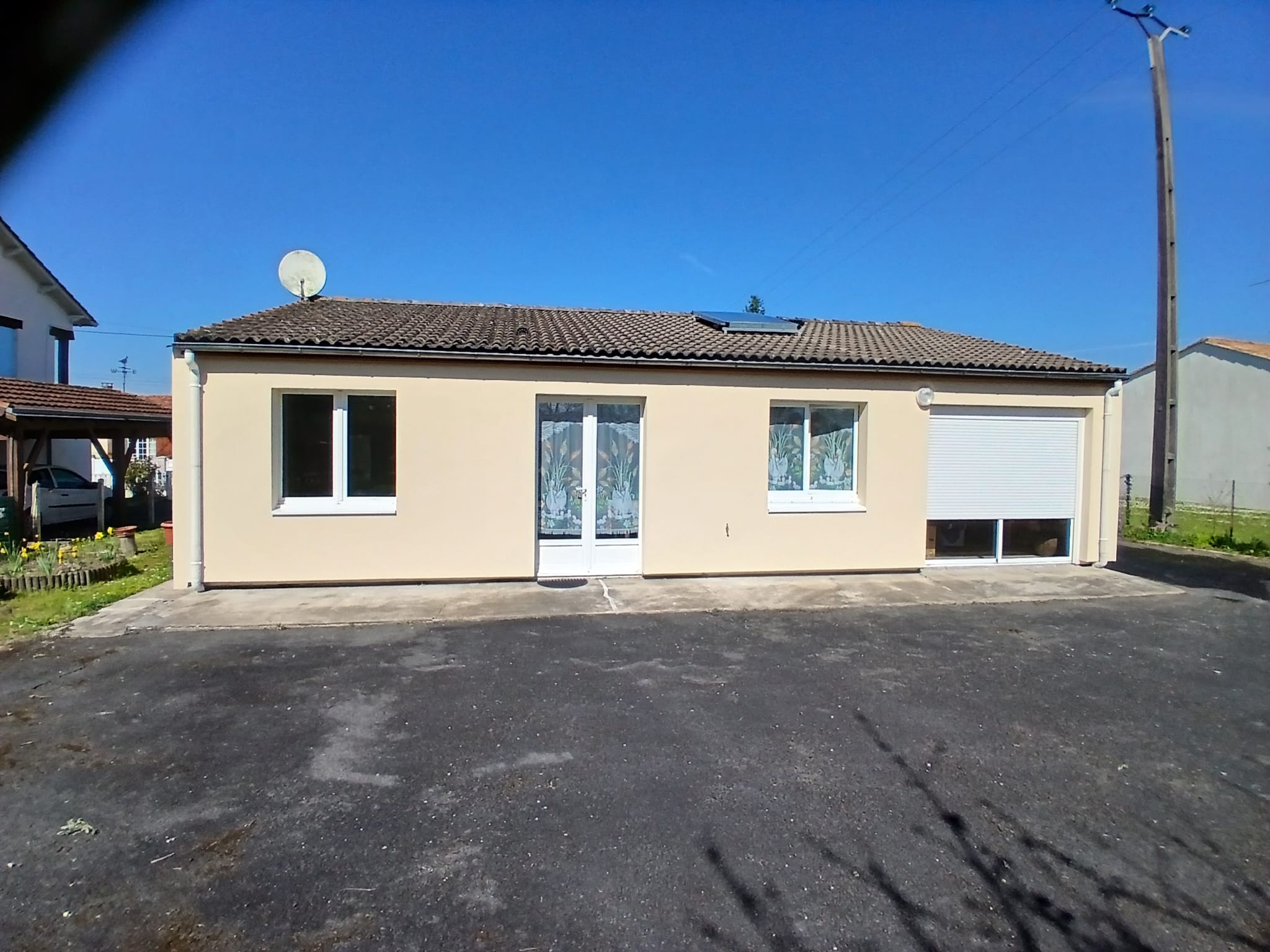 Pavillon plain-pied — finition ton pierre — après